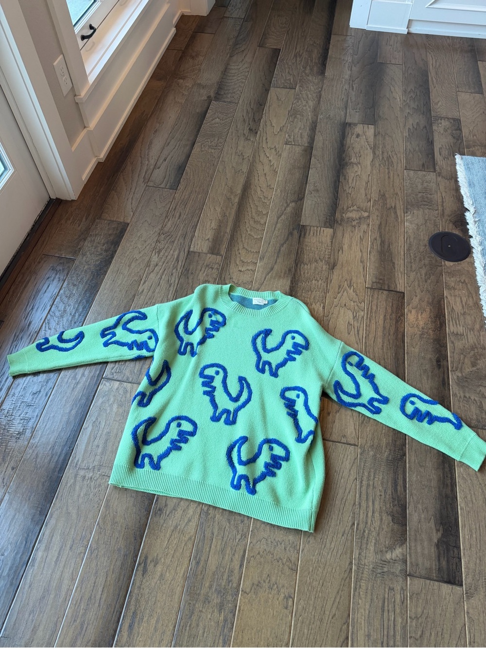 Bright Green Crewneck Sweater with Blue Dino Motifs